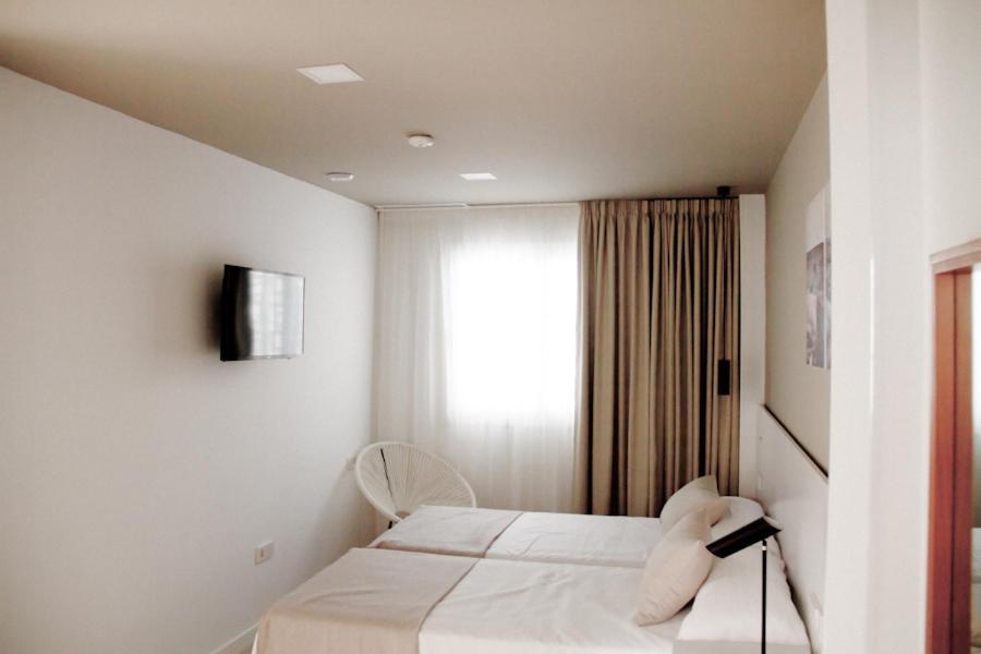 Sosiego Hostal De Mar ปวยร์โต เด มาซาร์รอน ภายนอก รูปภาพ